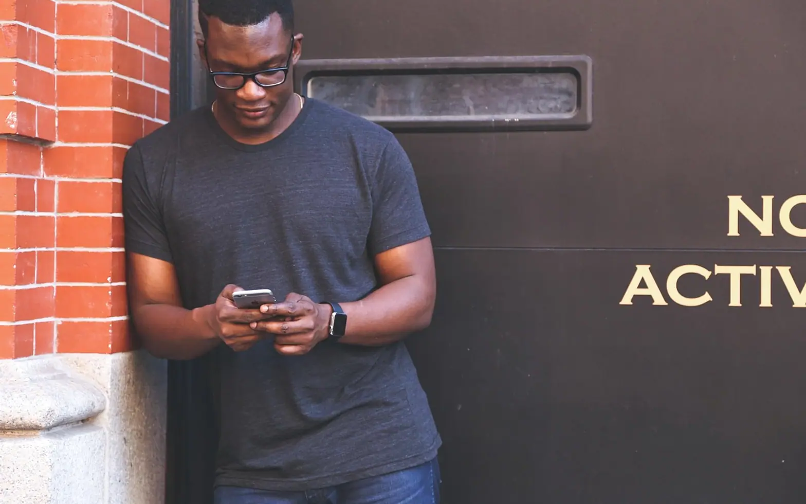 Man, black man and mobile phone